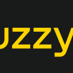 Un logo rectangulaire noir avec un cercle jaune sur la gauche représentant une étoile ou un atome abstrait, suivi d'un texte jaune gras "Fuzzy Logic" sur la droite. Ce logo Fuzzy Logic combine un design moderne avec une inspiration scientifique.