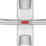 Un diagramme de maillage filaire, marqué comme un Brouillon auto, montre une coupe transversale d'une structure avec un tube horizontal central coupé par un canal vertical et une forme ovale rouge à l'intersection.