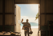 Un homme vêtu d'une chemise à fleurs fait un signe de la main en sortant d'un atelier pour se diriger vers une plage ensoleillée, souhaitant à tout le monde « Bonnes vacances » d'un geste enjoué. Il tient un casque de soudure à la main, et on aperçoit à l'intérieur de l'atelier des établis chargés d'outils. À l'extérieur, les palmiers et l'océan se balancent d'un air invitant.